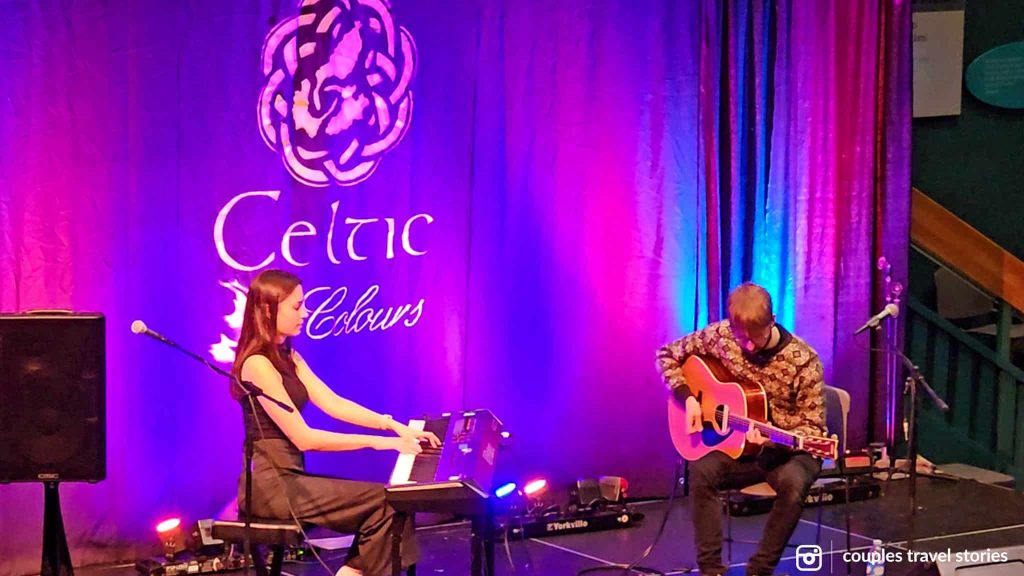 2 music players performing during Celtic Colors in Cape Breton Island in the Fall